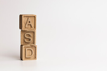photo on ASD (autism spectrum disorders) theme. wooden cubes with the abbreviation 