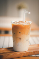 Iced latte coffee on a table inside the cafe.