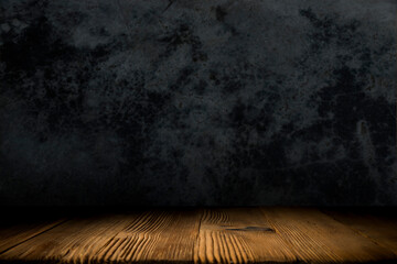 empty wooden table with smoke float up on dark background