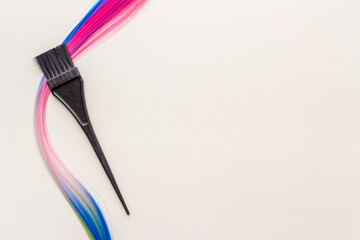 Hairdresser tools for hair dye - brush and strand of hair