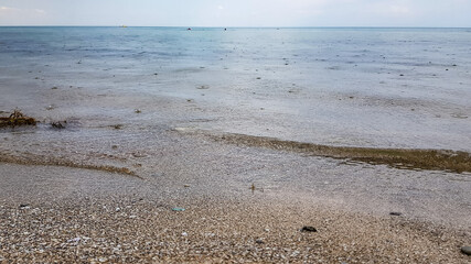 raindrops fall on the sea. bad weather on the beach