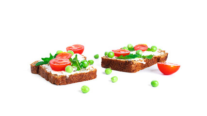 Bruschetta with cream cheese and vegetables isolated on a white background. Toasts isolated....