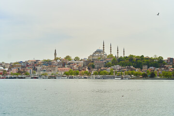 Fototapeta premium Istanbul, Turkey - May 2, 2021: View across the Bosphorus to the Suleymaniye Mosque.