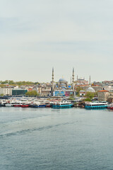 Istanbul, Turkey - May 2, 2021: View across the Bosphorus to the Suleymaniye Mosque.