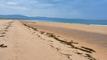 Embo beach looking north towards Ben Bhraggie and Golspie