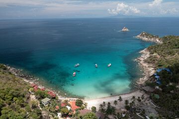Fototapeta premium Aow Leuk Beach on Koh Tao, Thailand Drone Aerial View of Stunning Scuba Diving Bay with boats