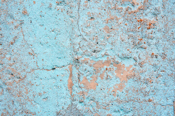 Fototapeta na wymiar Old concrete wall. Grunge background or texture. Old blue whitewashed lime plaster wall.