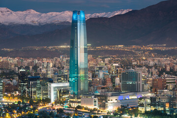 Skyline of Santiago de Chile at the foots of The Andes Mountain Range and buildings at Providencia...