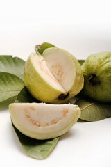 fresh guava fruit (tropical fruit) with slice isolated on white background.