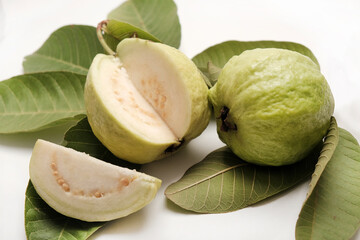 fresh guava fruit (tropical fruit) with slice isolated on white background.