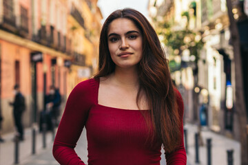 Attractive and beautiful young woman looking at camera