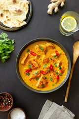 Chicken tikka masala curry with herbs and peppers. Indian food. National cuisine.