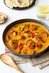 Chicken tikka masala curry with herbs and peppers. Indian food. National cuisine.