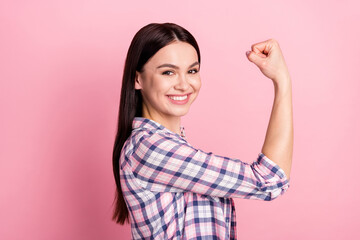 Profile photo of optimistic young millennial lady arm wear plaid shirt isolated on pink color background