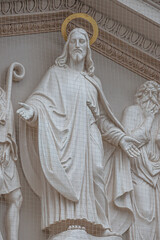 Bas relief sculpture of Jesus Christ and Biblical scene at the main portal of Evangelical church...