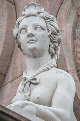Statue of beautiful sphinx in downtown of Potsdam, Germany, portrait, details