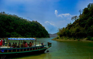 boats on the lake kaptai with hill background.