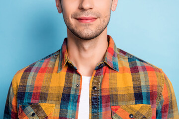 Cropped view portrait of attractive well-groomed guy fresh sensitive skin isolated over bright blue...