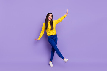 Fototapeta na wymiar Full size photo of funky happy charming young woman dance weekend enjoy isolated on purple color background