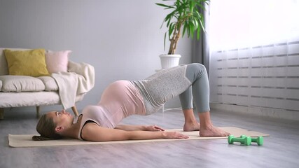 Active pregnant woman exercise lady does hips lift on floor Spbd