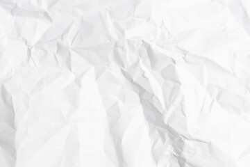 White crumpled paper texture background.