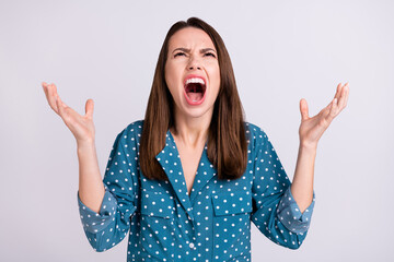 Photo of yell angry brunette hair millennial lady hands up wear blue shirt isolated on grey color...