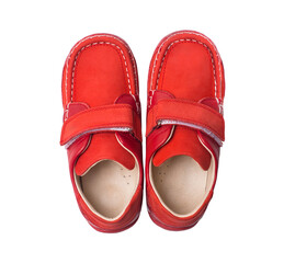 Red kids shoes isolated on white.