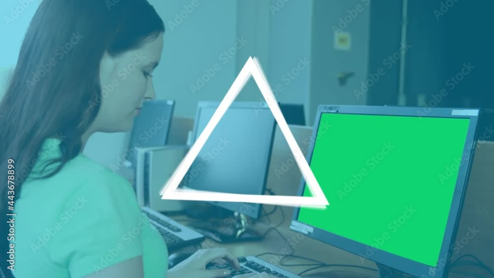 Poster animation of triangles spinning over female student using computer with green screen