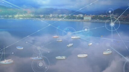 Animation of moving network of connections, over beautiful coastal landscape - Powered by Adobe