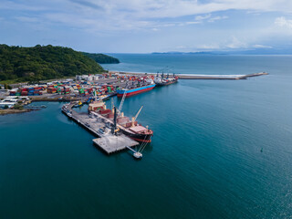 Beautiful aerial view of the Caldera Port in Puntarenas Costa Rica, full with cargo ships