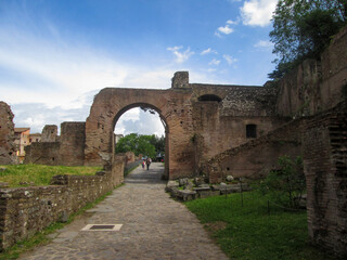 Fototapeta na wymiar City gates of Rome inside the roman forum, ruins of the castle of the roman forum, Tourism concept