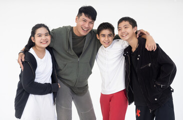 Fototapeta premium Portrait of a group of b-boying students posing as the teacher suggested on white background. Young student hip-hop dancer.