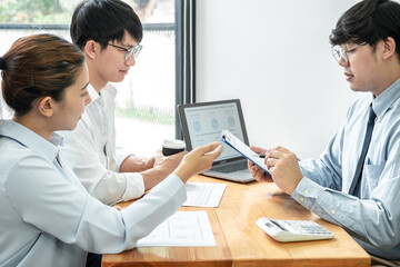 Asian couple meeting with financial advisor to consultation and asking about investment of new business