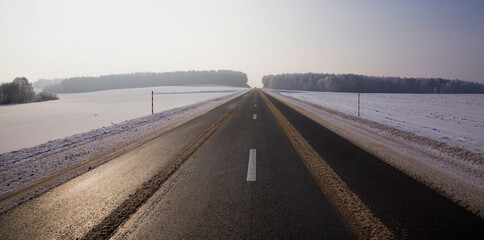 Fototapeta premium wide paved winter road