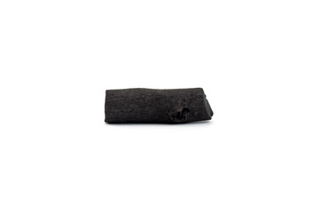 Natural wood charcoal isolated on white background. Pile of coal isolated on white background.