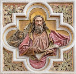 VIENNA, AUSTIRA - JUNI 24, 2021: The relief of St. Mark the Evangelist in church St. Severin.
