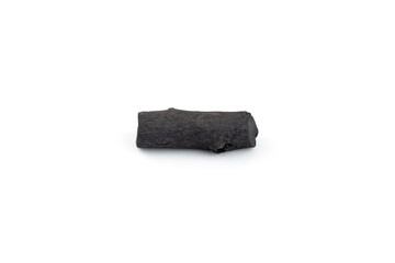 Natural wood charcoal isolated on white background. Pile of coal isolated on white background.