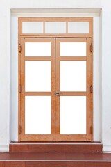 Vintage brown painted wooden door frame isolated on a white background