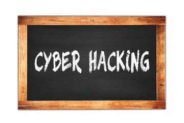 Fototapeta premium CYBER HACKING text written on wooden frame school blackboard.