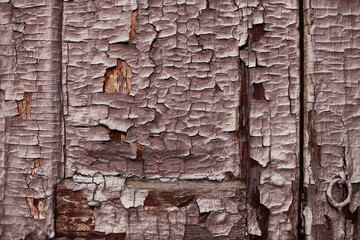 Wood texture with peeling flaking paint. Brown background