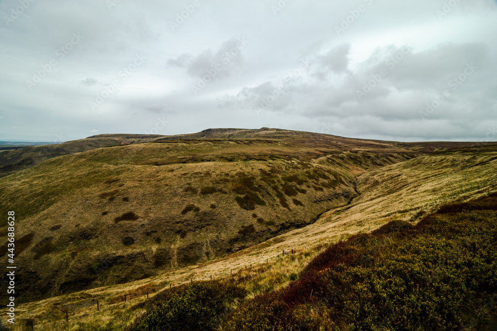 Wall mural walking in peak district england, higher shelf stones