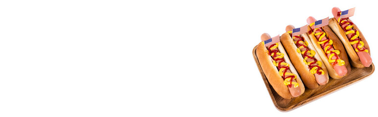 wooden tray with tasty hotdogs isolated on white, banner