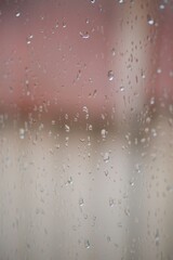 Rain drops or condensation on the glass.