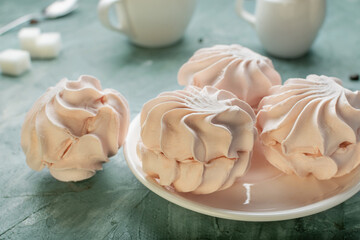 Sweets. Apple marshmallows on a plate. Tea party with marshmallows. Sweets for tea.