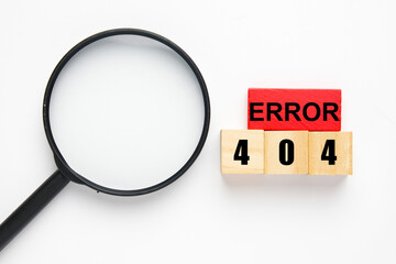 A picture of wooden block red and brown with the word Error 404. Try and error concept