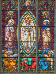 VIENNA, AUSTIRA - JUNI 24, 2021: The  Transfiguration on the stained glass in the Votivkirche...