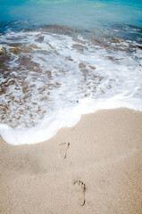 footprints on the beach