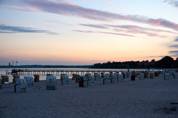 beautiful sunset on the white baltic sea beach