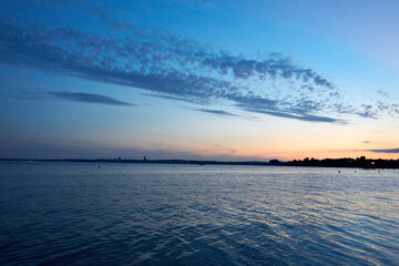 beautiful sunset on the white baltic sea beach