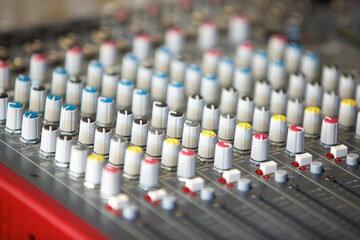 Obraz premium DJ remote to control the sound while recording music